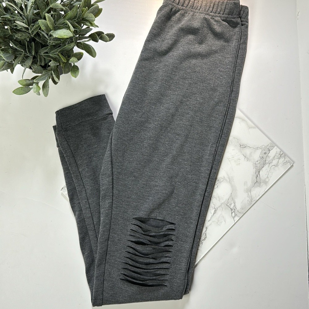 Unbranded split knee leggings with elastic waist size small .NWOT